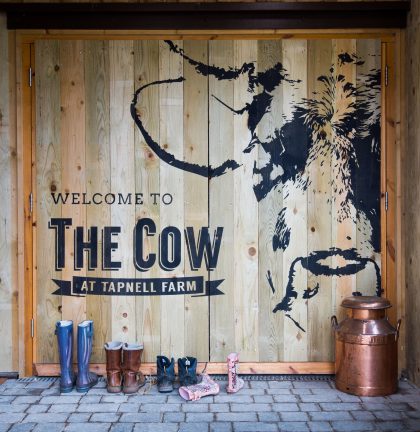 The Cow entrance with logo